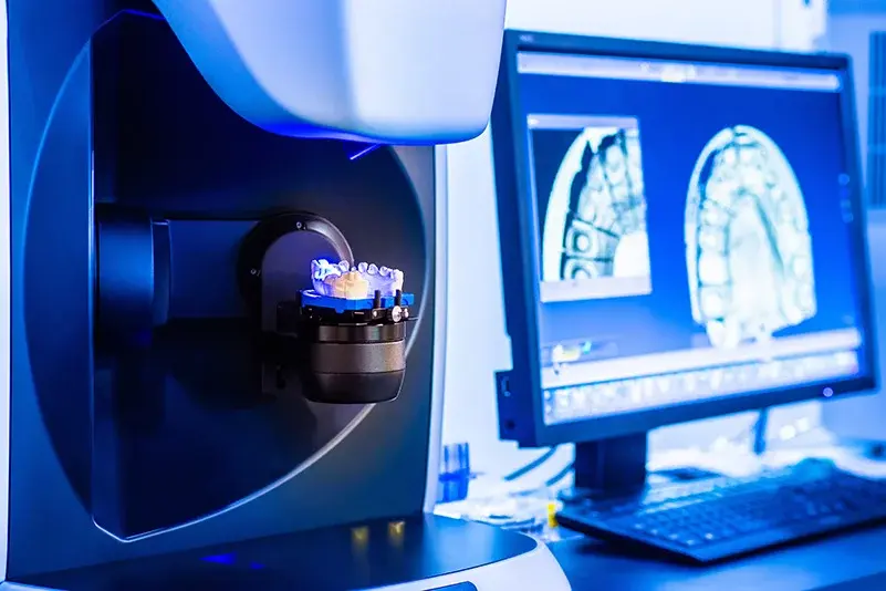 Lab scanner verifying restoration fit