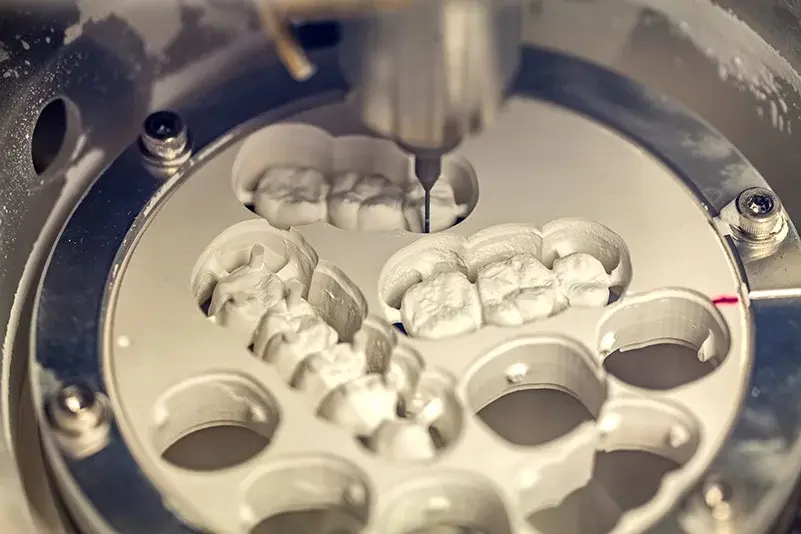 Zirconia restorations being milled in-house at Teeth by Design